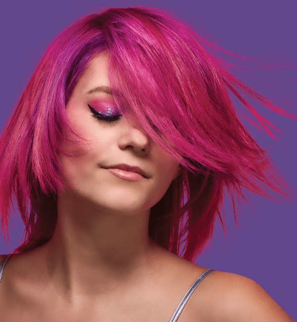 model with vivid pink hair with purple highlights