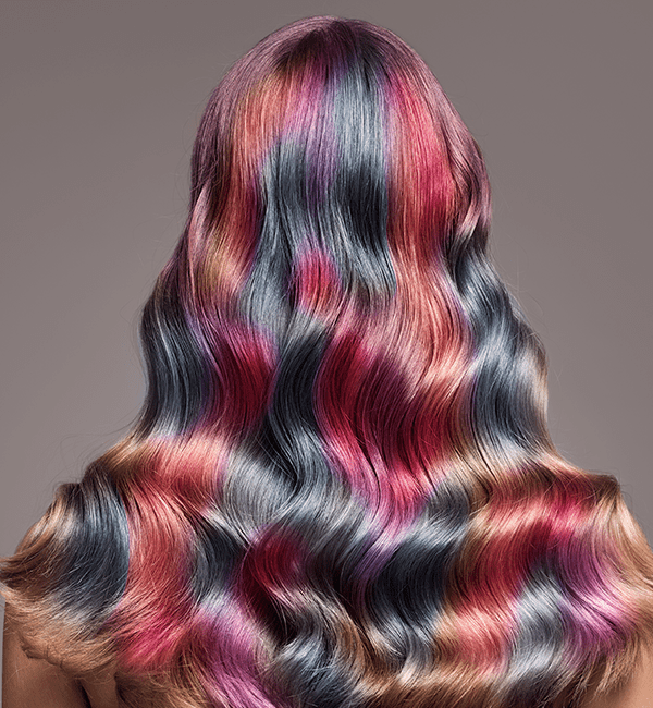 model with long, multicolor hair, mermaid hair trend