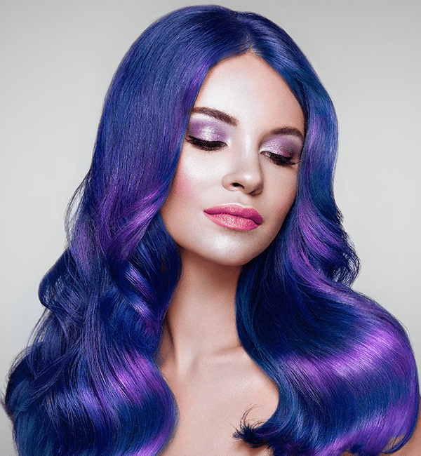 model with long blue violet hair with bright purple highlights