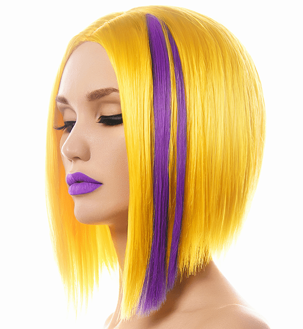 model with long, layered bob in bright yellow and bright purple streaks