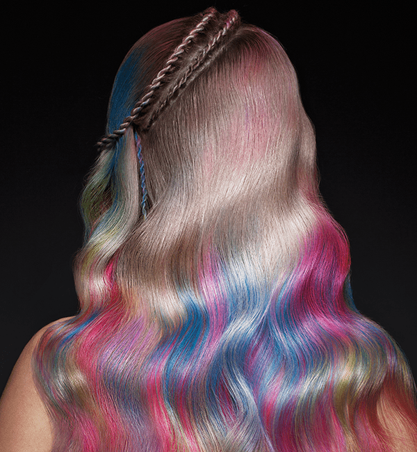 model with long, multicolor highlights on blonde hair, mermaid hair trend