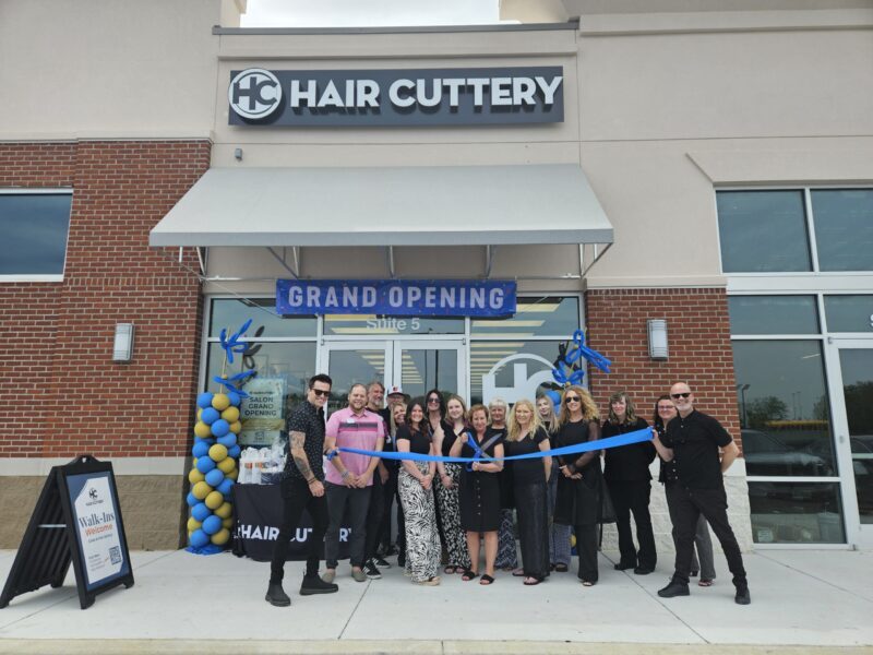 The Hair Cuttery team assembled outsife the Grand Opening