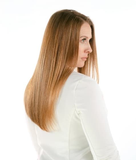 Woman with long flowing red hair.