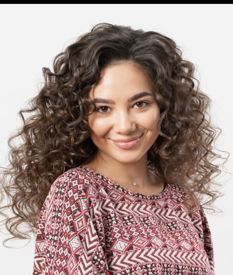 Woman with long specialty perm.